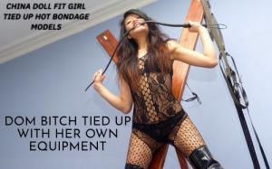 trussedup.com - strung up China doll  tied up with flesh cutting rope st Andrews cross bondage thumbnail